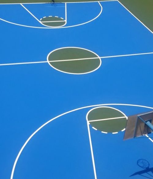 Pavimento deportivo de asfáltico y slurry para una pista de baloncesto